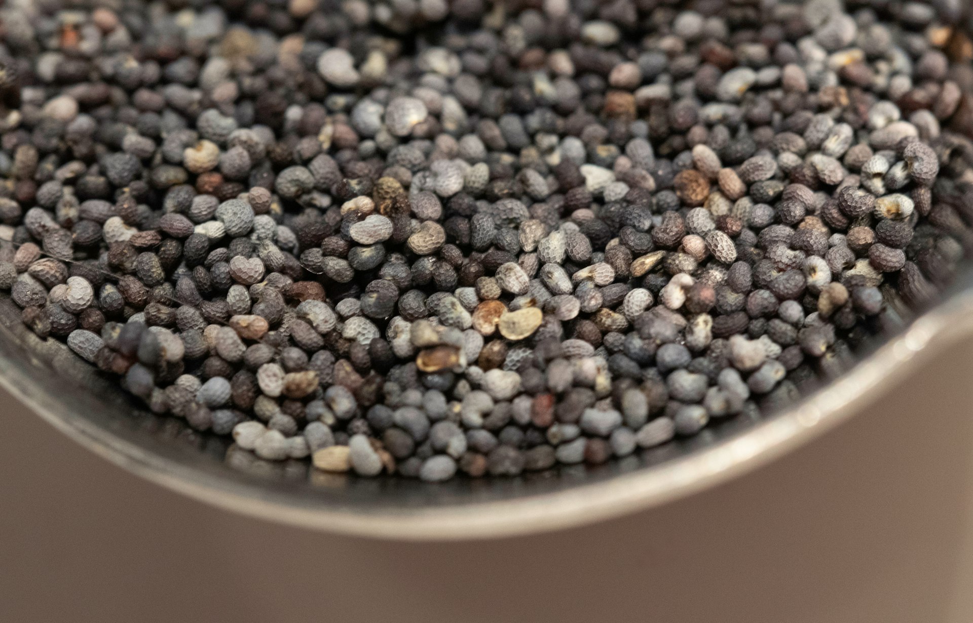 a close up of a pot filled with black beans